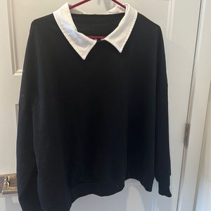 Black sweater with White collar